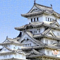 plastic-puzzle-himeji-jo-castle-in-spring-cherry-blossoms-jigsaw-puzzle-1000-pieces.80582-2.fs.jpg