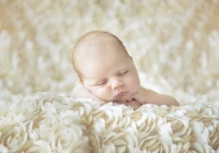 konrad-bak-baby-sleeping-in-the-roses-jigsaw-puzzle-1000-pieces.55636-1.fs.jpg